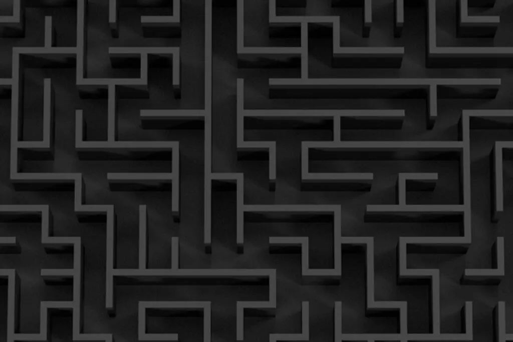 A 3D rendering of the product "george-dagerotip-Vb-kAzcIiXg-unsplash" depicts a black, intricate maze with numerous twists and turns. Elevated walls create complex pathways and dead ends, while the entire image maintains a dark, monochromatic tone that emphasizes the depth and structure of the labyrinth.